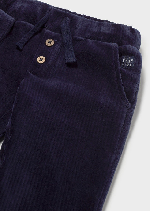 Soft knit trousers in classic blue, crafted from a breathable cotton-blend fabric with just the right stretch. Gentle on delicate skin and easy to move in—perfect for everyday wear.