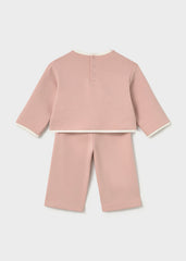 Mayoral A two-piece baby set in dusty pink, featuring a long-sleeve top with white ribbed trim and a teddy bear applique with hearts on the chest, paired with matching cropped pants.