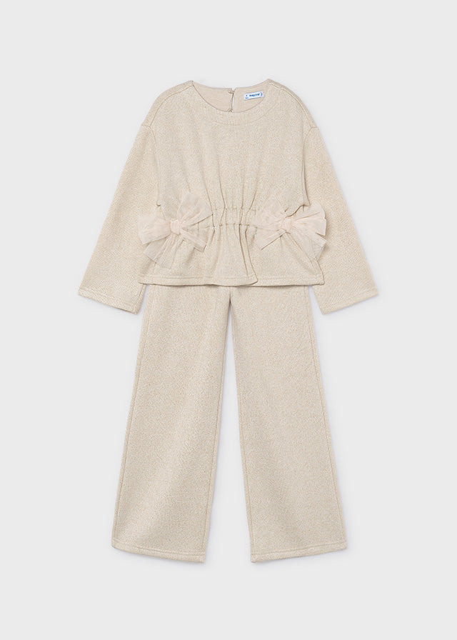 Mayoral Girls Knit Trouser Set in soft beige tones. A coordinated two-piece outfit featuring a comfortable knit construction, perfect for any occasion.
