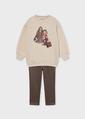 Mayoral Girls Coordinated two-piece outfit featuring a girls fashion print top paired with blotch print leggings. Perfect for everyday wear. Chestnut