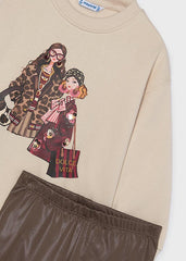 Mayoral Girls Coordinated two-piece outfit featuring a girls fashion print top paired with blotch print leggings. Perfect for everyday wear. Chestnut