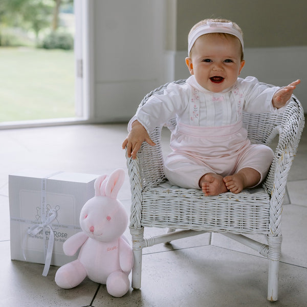 Emile et Rose  Florence is a beautiful baby girls’ all in one with a simple white rounded collar edged with pink piping. 