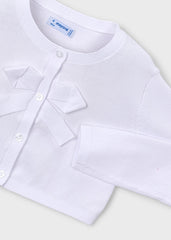 A soft knit tricot cardigan by Mayoral in classic white.