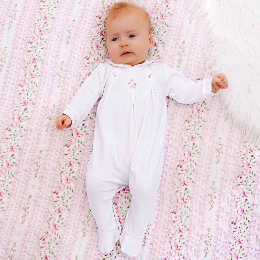 EMILE ET ROSE New for this season Lara, is a practical twin pack of babygrows for girls. One babygrow is in our signature pink, the other white with pink piping.