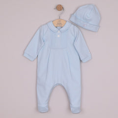 Emile et Rose Michael is a lovely baby boys’ outfit that represents traditional baby clothes at their best. A beautifully embroidered, square yoke with feather stitch embroidery and tiny vertical pintuck pleats, take centre stage. Framed by a little collar, two pearlised buttons and a cosy matching pull on hat add lovely finishing touches to this set.