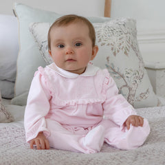 EMILE et ROSE Maddy is a beautiful baby girls babygrow in sumptuous pink velour. With its intricate flower embroidered, frilled inset yoke and pretty scalloped collar this is a very feminine outfit. Pink and white feet with little satin bows completes this gorgeous all in one.