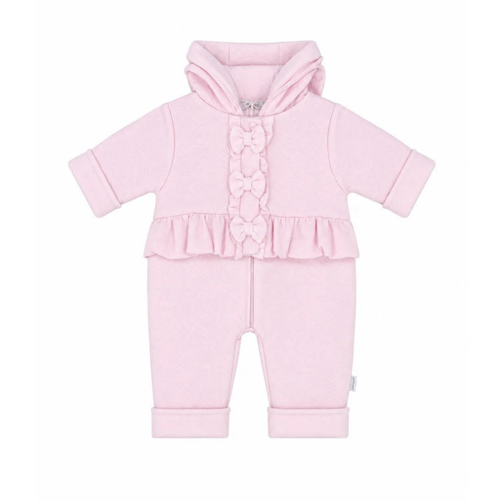 Pastels & Co - Hearts & Bows Story. The Freya Pramsuit in soft pale pink offers timeless elegance for baby girls.