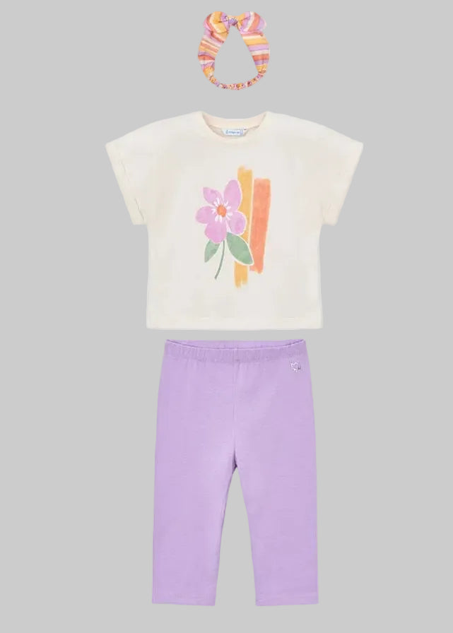 A charming Mayoral short-sleeved tee paired with a matching hairband. Perfect for adding instant style to any outfit!