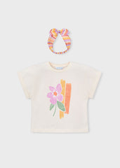 A charming Mayoral short-sleeved tee paired with a matching hairband. Perfect for adding instant style to any outfit!