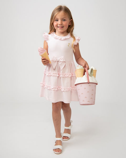 Caramelo Kids pink-mazing tiered frill dress complete with a pretty bow!