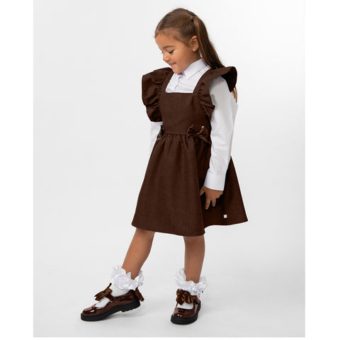 Brown flared pinafore with bow from Caramelo Kids.