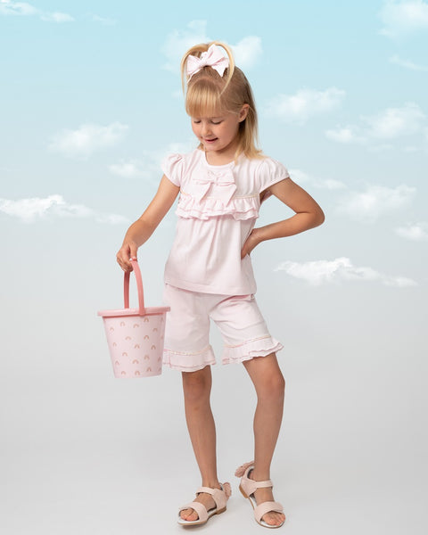 Caramelo Kids pink tiered frill shorts paired with a coordinating headband