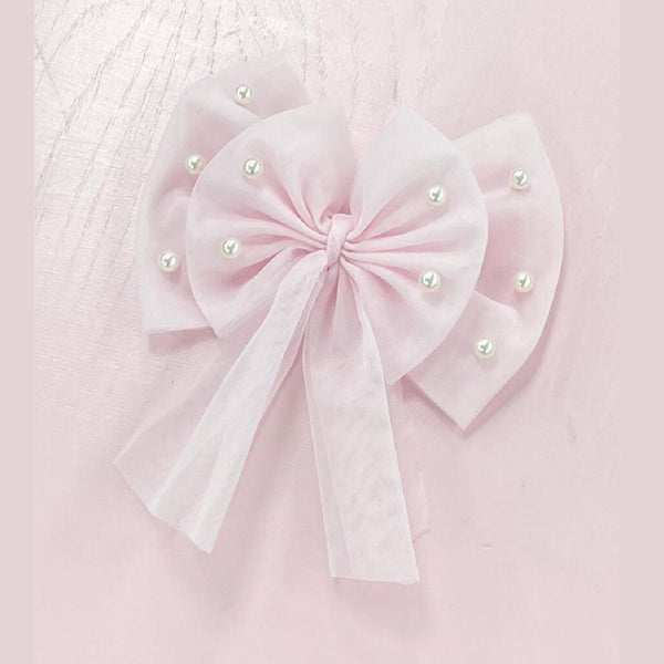 Pink Pearl Hairbow with alligator clip from Caramelo Kids.