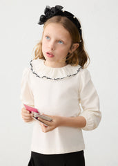 Mayoral girls cotton ruffled neckline blouse matched with pleated skorts in classic black