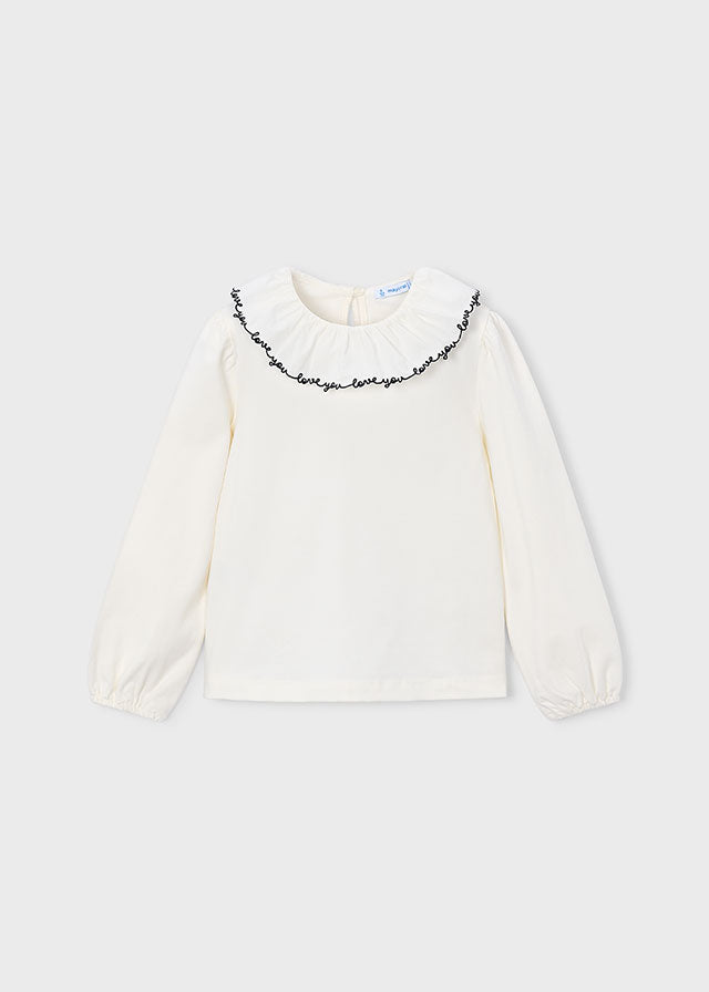 Mayoral girls cotton ruffled neckline blouse matched with pleated skorts in classic black