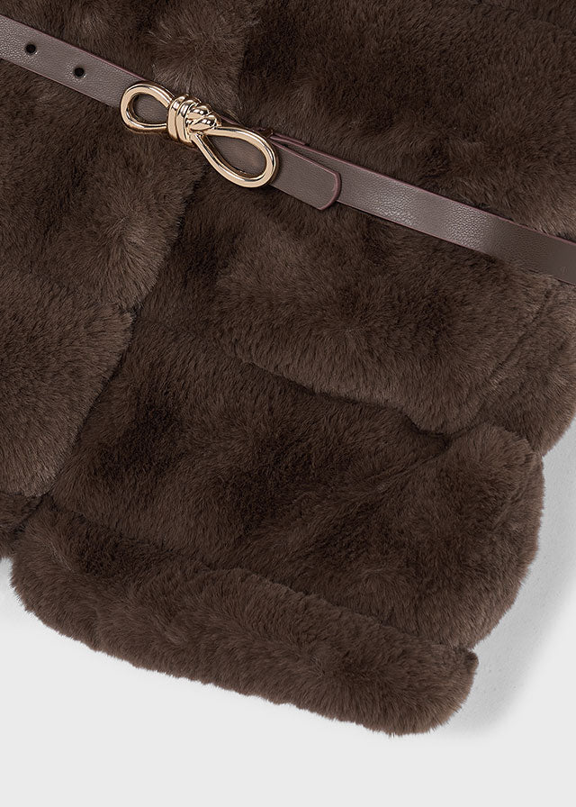 Mayoral Girls Fur Gilet with Belt in coffee. Lightweight layering piece featuring faux fur detailing and an adjustable belt for a polished finish.