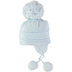 EMILE et ROSE Griffin - Baby blue knitted helmet-shaped hat with ear flaps and small pompoms trimming the ends of the ties below each ear. The main feature is the fun, over-size pompom on the top!