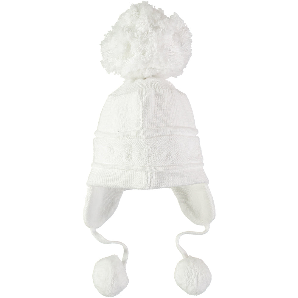 EMILE et ROSE Griffin - Baby white knitted helmet-shaped hat with ear flaps and small pompoms trimming the ends of the ties below each ear. The main feature is the fun, over-size pompom on the top!