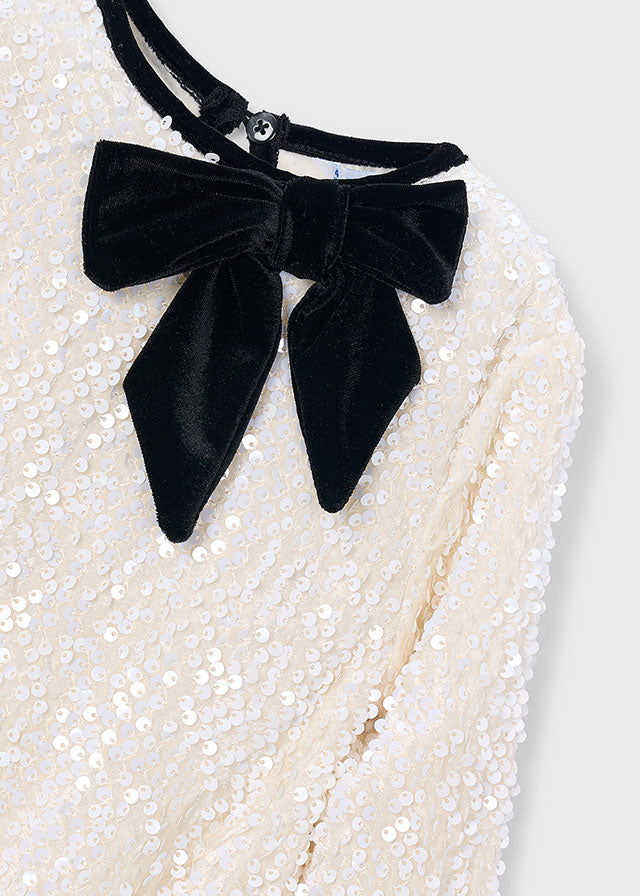 Mayoral sequin dress for girls featuring a charming bow detail.