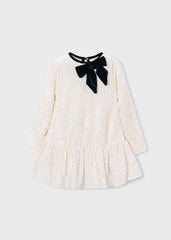 Mayoral sequin dress for girls featuring a charming bow detail.