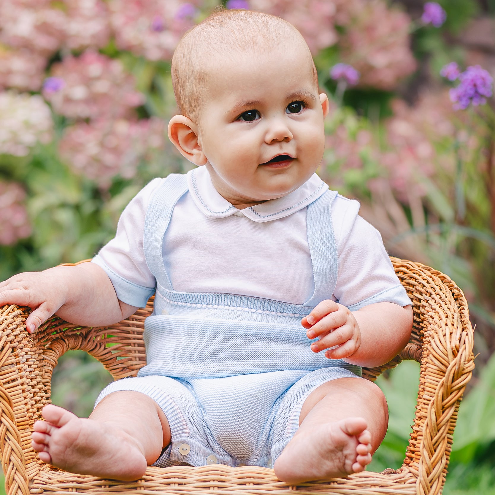 EMILE ET ROSE Lowe romper is the perfect style for summer with its combination of shirt top and knitted bottom.