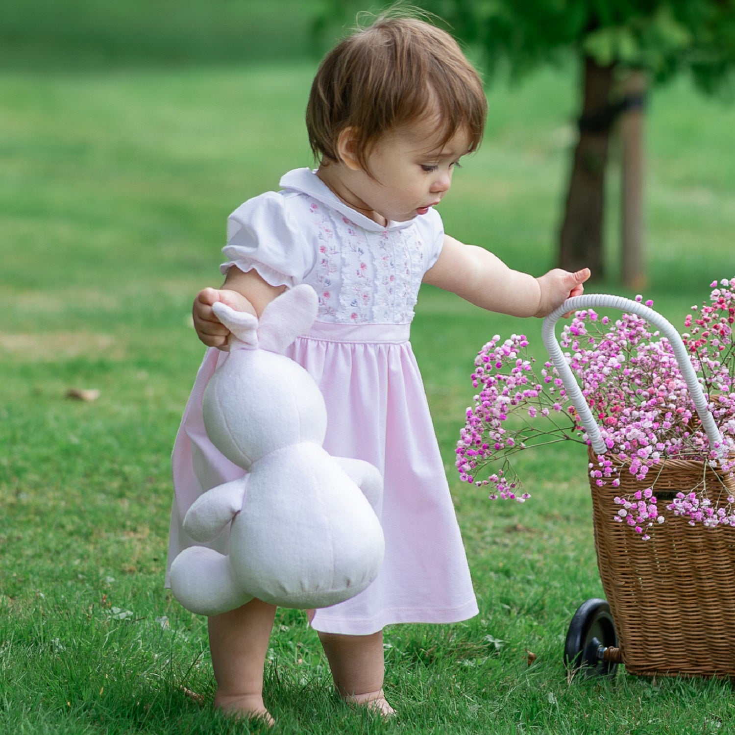 EMILE ET ROSE LILAH The top half of this beautiful dress is white with alternate columns of gorgeous embroidery in shades of pink &amp; grey and intricate lace running vertically from collar to waist.