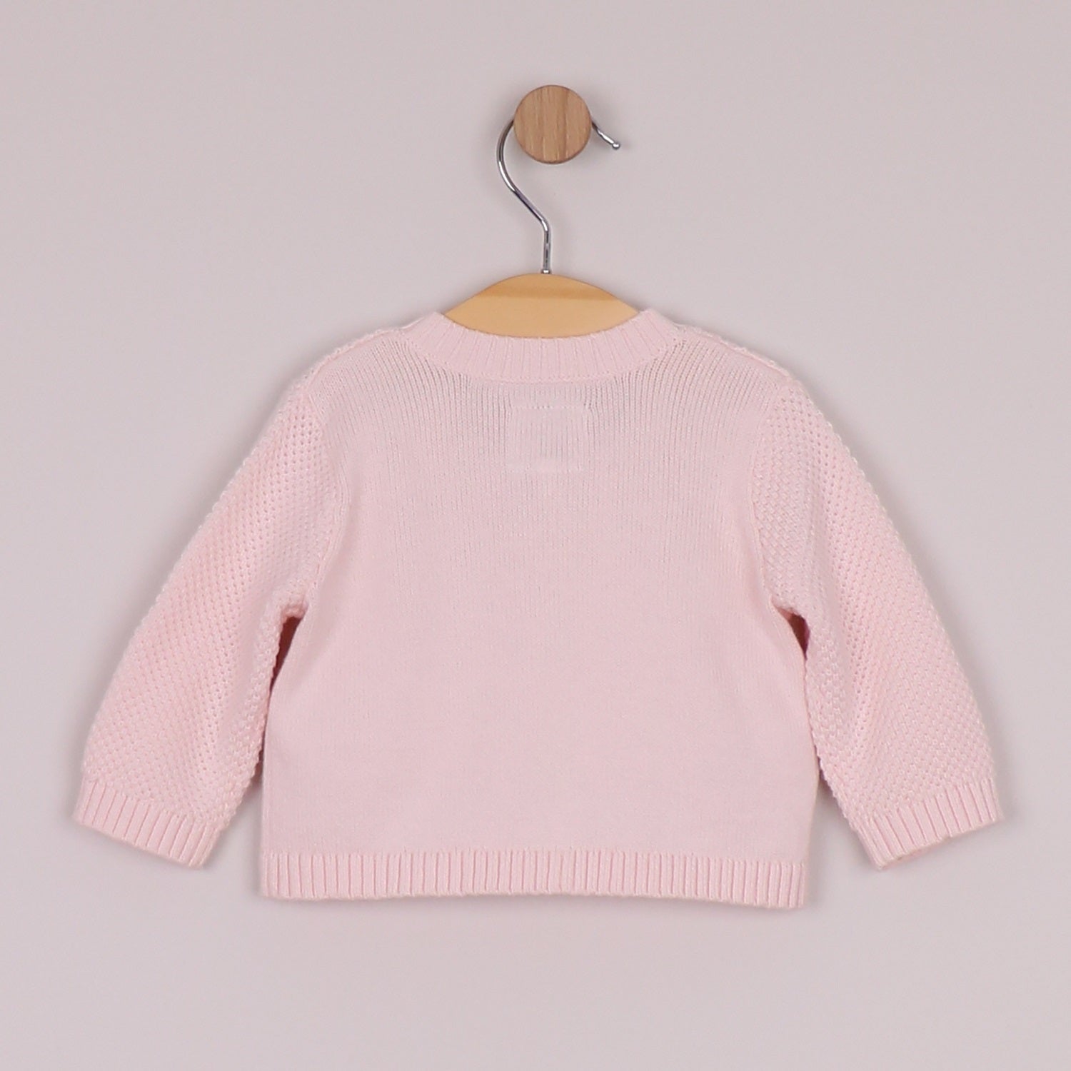 Emile et Rose baby pink cardigan with pearalised buttons.