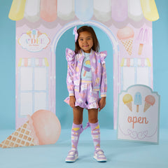 ADEE Pastel Parlour Complete the look with The Stephanie all over printed Ice Cream bomber. 
