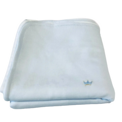 Handcrafted blanket in Peru with charming embroidered crowns motif in pale blue and gold. A special gift for a new baby boy from the Adriana Mae Celeste Real Collection. Pima Cotton.