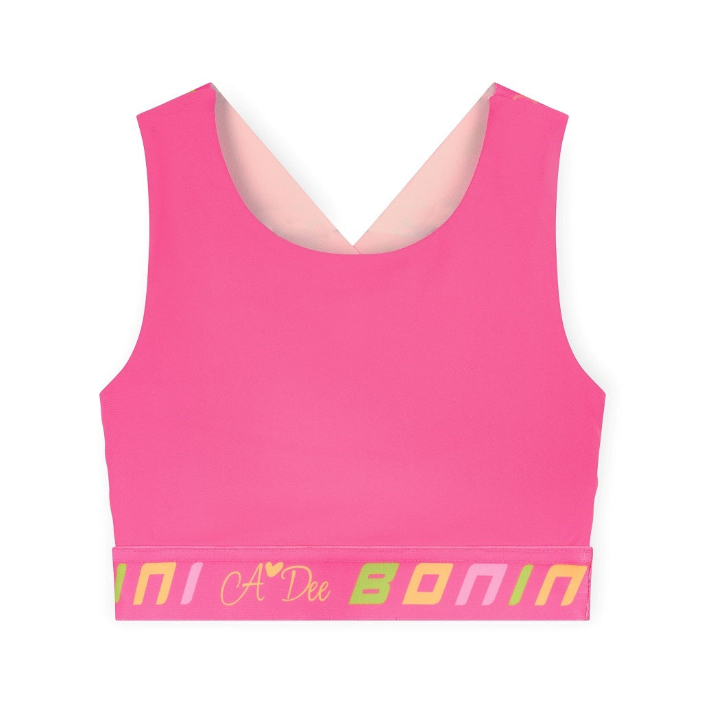 BONINI by ADee The Flex colour block crop top features logo tape cross back straps and is designed to match pieces within the collection. Hot Pink