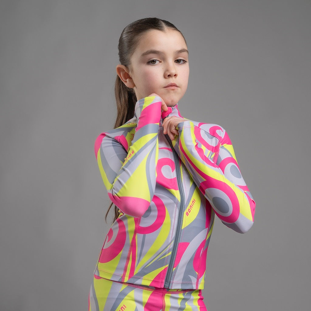 BONINI by ADee The Revive Zipper features a sporty, slim-fit design and finger holes at the cuff for added comfort, made in our new swirl print. Hot Pink