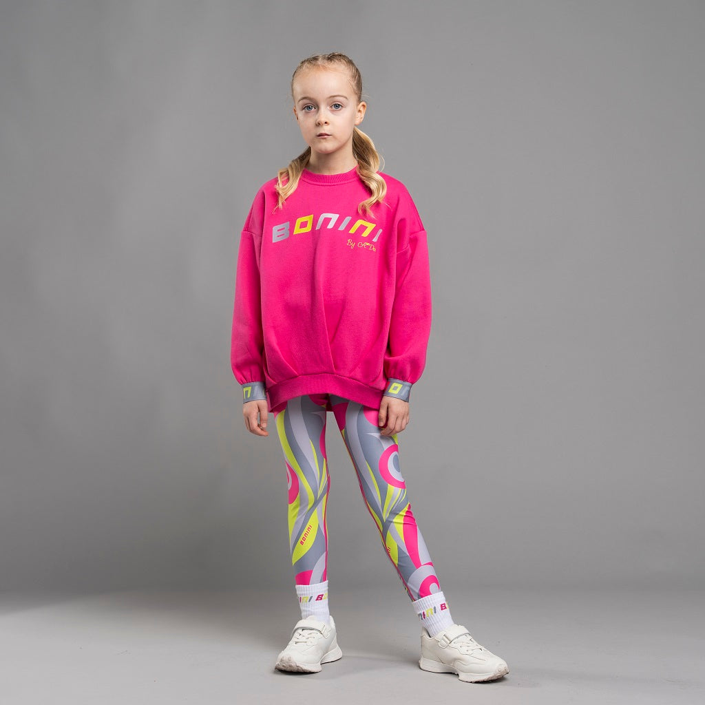 BONINI by ADee The Adapt sweatshirt features a graphic design front logo. Made from super soft cotton sweat, it features an oversize design and branded elasticated cuffs. Hot Pink