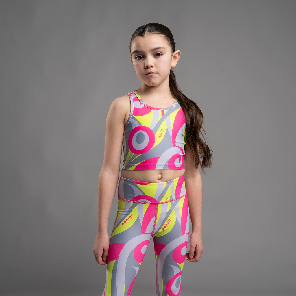 BONINI by ADee The Ignite Crop Top features a streamlined fit with a racerback design and bold swirl print for a vibrant, athletic look. Hot Pink