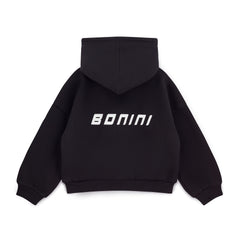 BONINI by ADee The Revive Hoodie features a relaxed fit with a cropped silhouette. Finished with signature Bonini branding, it’s perfect for layering or pairing with matching pieces for an effortless everyday look. Black