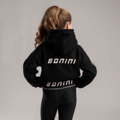 BONINI by ADee The Revive Hoodie features a relaxed fit with a cropped silhouette. Finished with signature Bonini branding, it’s perfect for layering or pairing with matching pieces for an effortless everyday look. Black