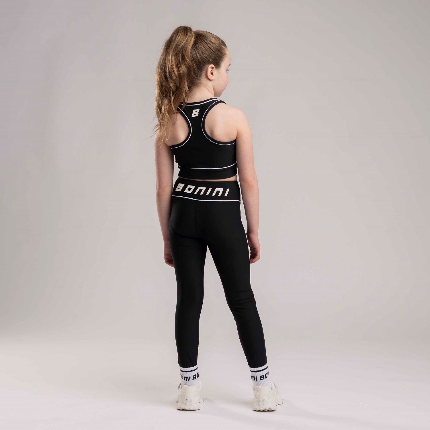 BONINI by ADee A sporty staple with a clean finish, the Revive Vest Top offers a comfortable, fitted shape. Finished with signature Bonini detailing. Black