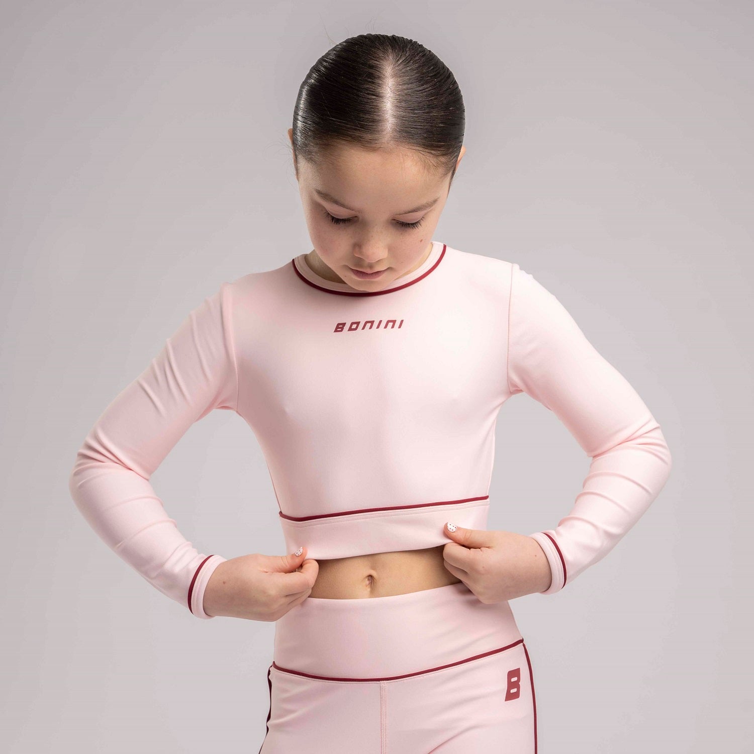 BONINI by ADee The Revive Long Sleeve Crop Top features a cropped fit with a comfortable feel. Finished with Bonini branding, it’s perfect for &nbsp;pairing with matching pieces. Light Pink