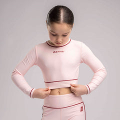 BONINI by ADee The Revive Long Sleeve Crop Top features a cropped fit with a comfortable feel. Finished with Bonini branding, it’s perfect for &nbsp;pairing with matching pieces. Light Pink