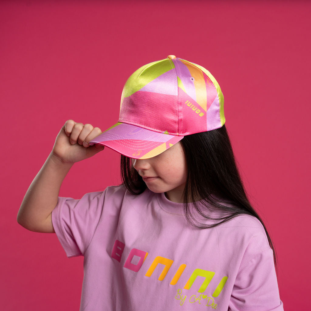 BONINI by ADee The Unique cap features colourblocking designs and a signature gradient print 'B' print on the front. Hot Pink