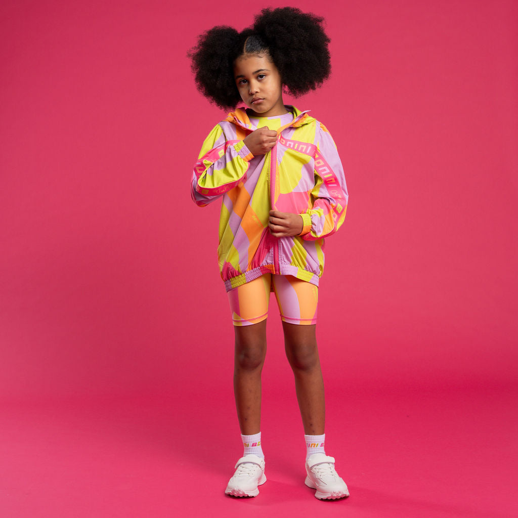 The Future sports jacket &nbsp;features an all-over print design with Bonini By A*Dee logo tape design across the front and sleeves. Hot Pink
