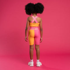 BONINI by ADee The Flex colour block crop top features logo tape cross back straps and is designed to match pieces within the collection. Hot Pink