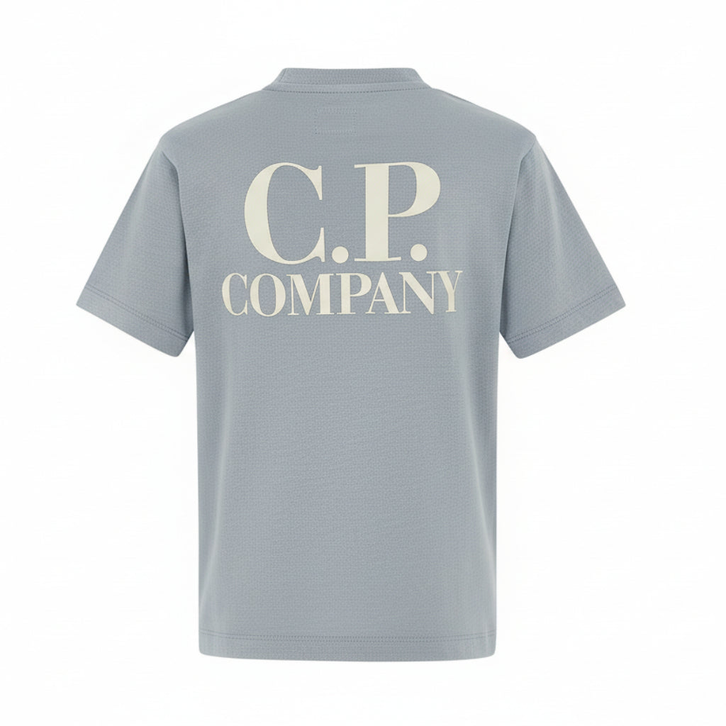 C.P. COMPANY Boys Cotton short sleeved t-shirt. Chest and back with printed logo, ribbed crewneck. Regular Fit. Silver Blue