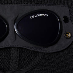 C.P. Company Kids' balaclava in black delivers warmth and protection with full-face coverage ideal for snowy play and cold weather outings. Crafted from soft wool. 