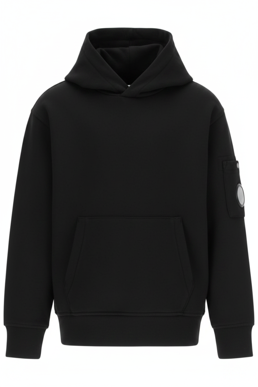 CP Company Kids sweatshirt with iconic lens and kangaroo pocket, ribbed texture, and reinforced cuffs and hem. Regular fit for everyday versatility. Black