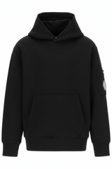 CP Company Kids sweatshirt with iconic lens and kangaroo pocket, ribbed texture, and reinforced cuffs and hem. Regular fit for everyday versatility. Black