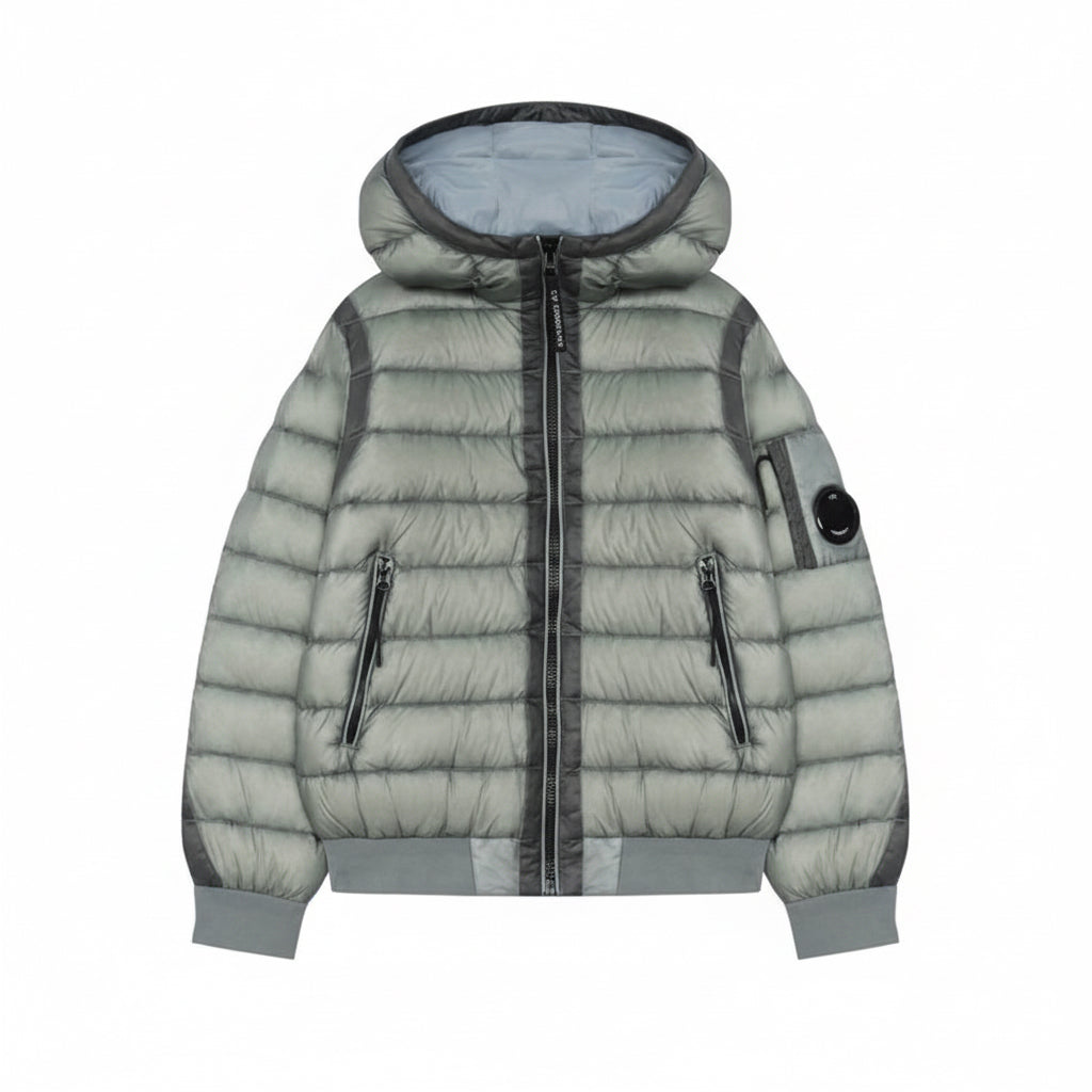 CP Company Hooded shell jacket with adjustable hood, full zip fastening, side pockets, and C.P. Company's signature lens detail. Ribbed cuffs and hem. Regular fit.