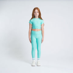BONINI The Aspire Leggings feature their classic sport style and printed logo artwork on the back of the waistband. Bold Mint