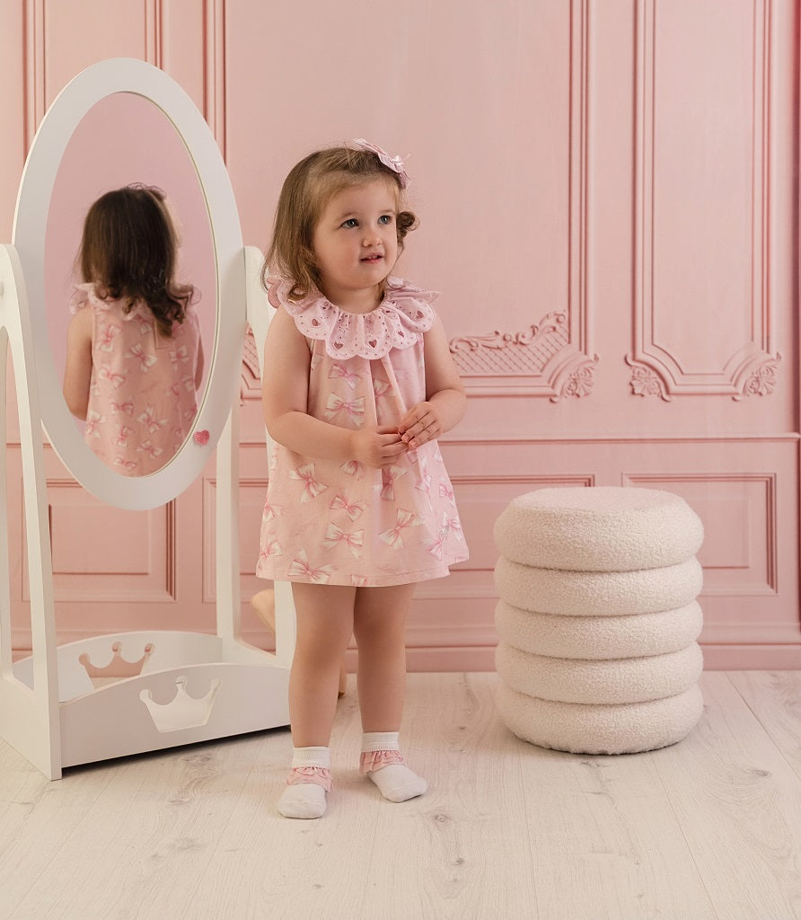 LITTLE A Perfectly Pink. The Opal dress features an all over bow print finished with a beautiful broderie anglaise collar. Pink Blossom