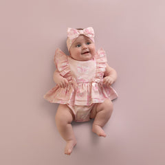 LITTLE A Perfectly Pink.&nbsp;The Odessa romper is made with cute all over bow print poplin, finished with frill and bow details finished with diamante branding. Pink Blossom