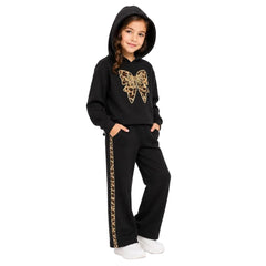 Girls black two-piece tracksuit with leopard print details, featuring a large leopard-print bow on the chest and matching leopard-print side stripes on the pants. 